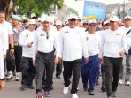 Kapolri Kapolri Jenderal Listyo Sigit Prabowo menghadiri acara jalan santai Persatuan Wartawan Indonesia (PWI) dan Kick Off menuju Hari Pers Nasional (HPN) 2026